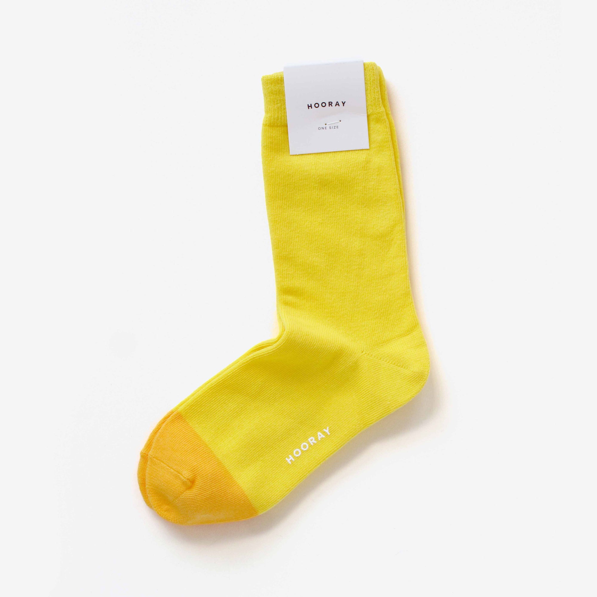 Alamo yellow cotton crew sock with Hooray label tag – showcasing the two-tone design and craftsmanship.