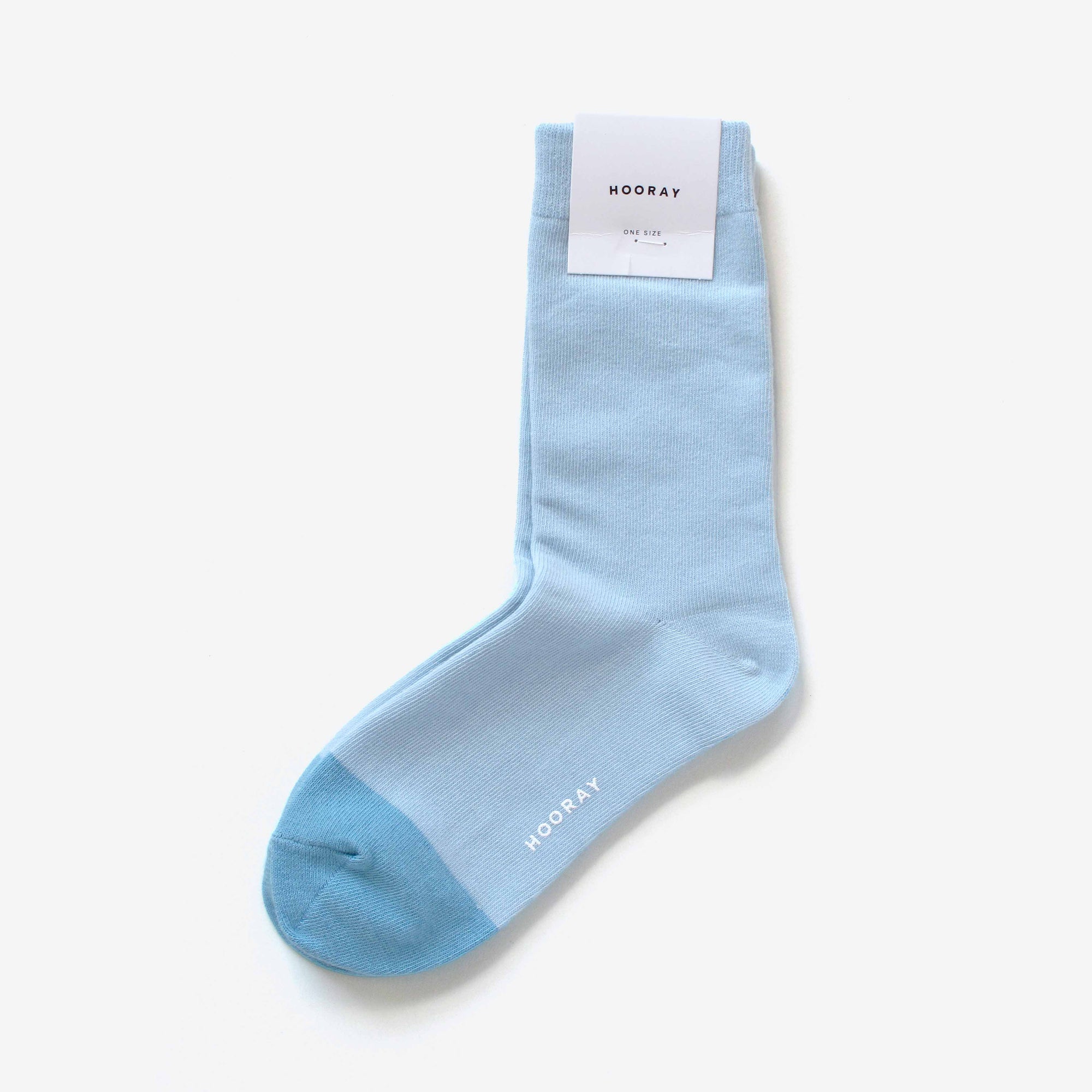 Balboa  skyblue cotton crew sock with Hooray label tag – showcasing the two-tone design and craftsmanship.
