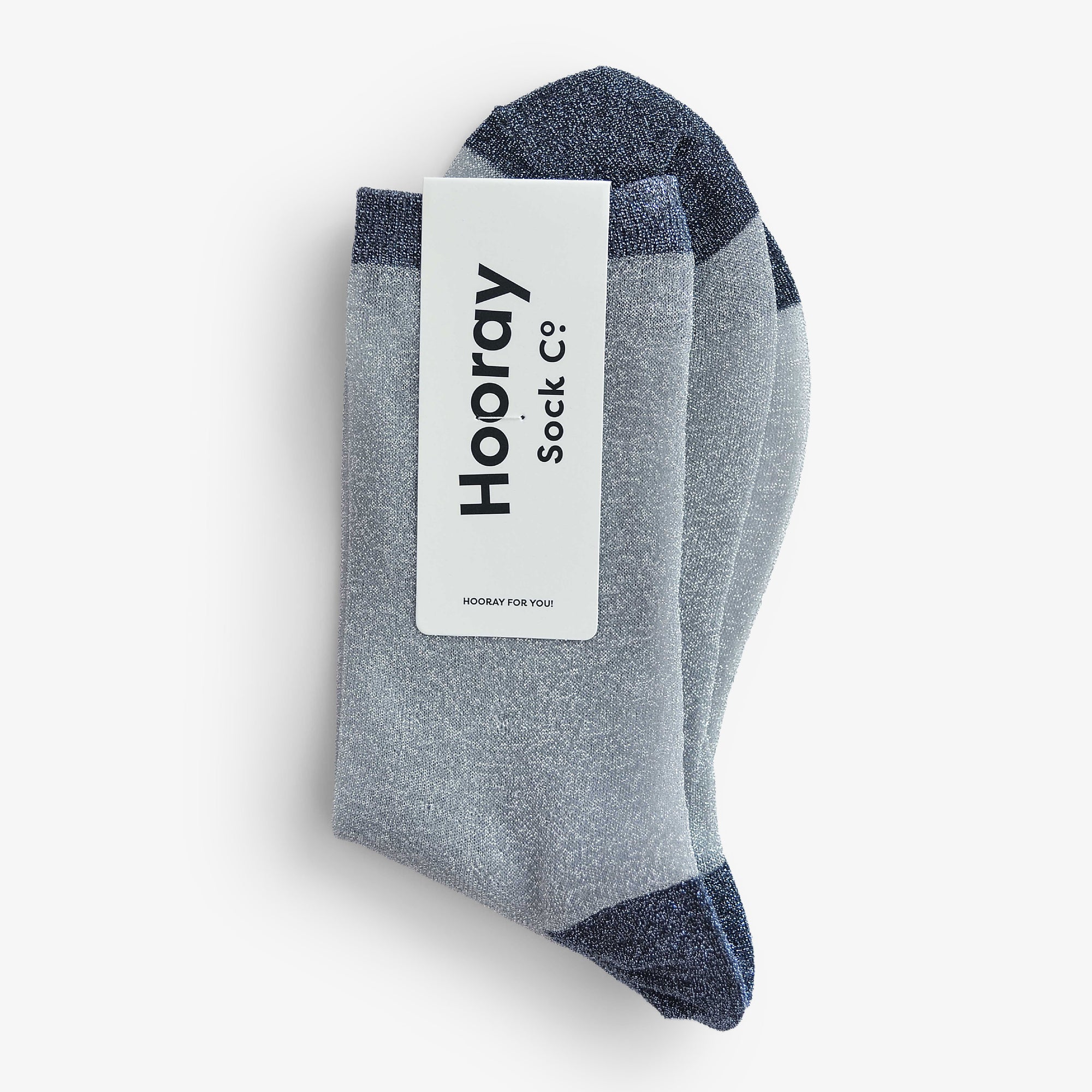 Elevate your style with Broadway socks in Black, Silver, Brick, or Blue. Short crew length with subtle metallic thread. Made in South Korea.