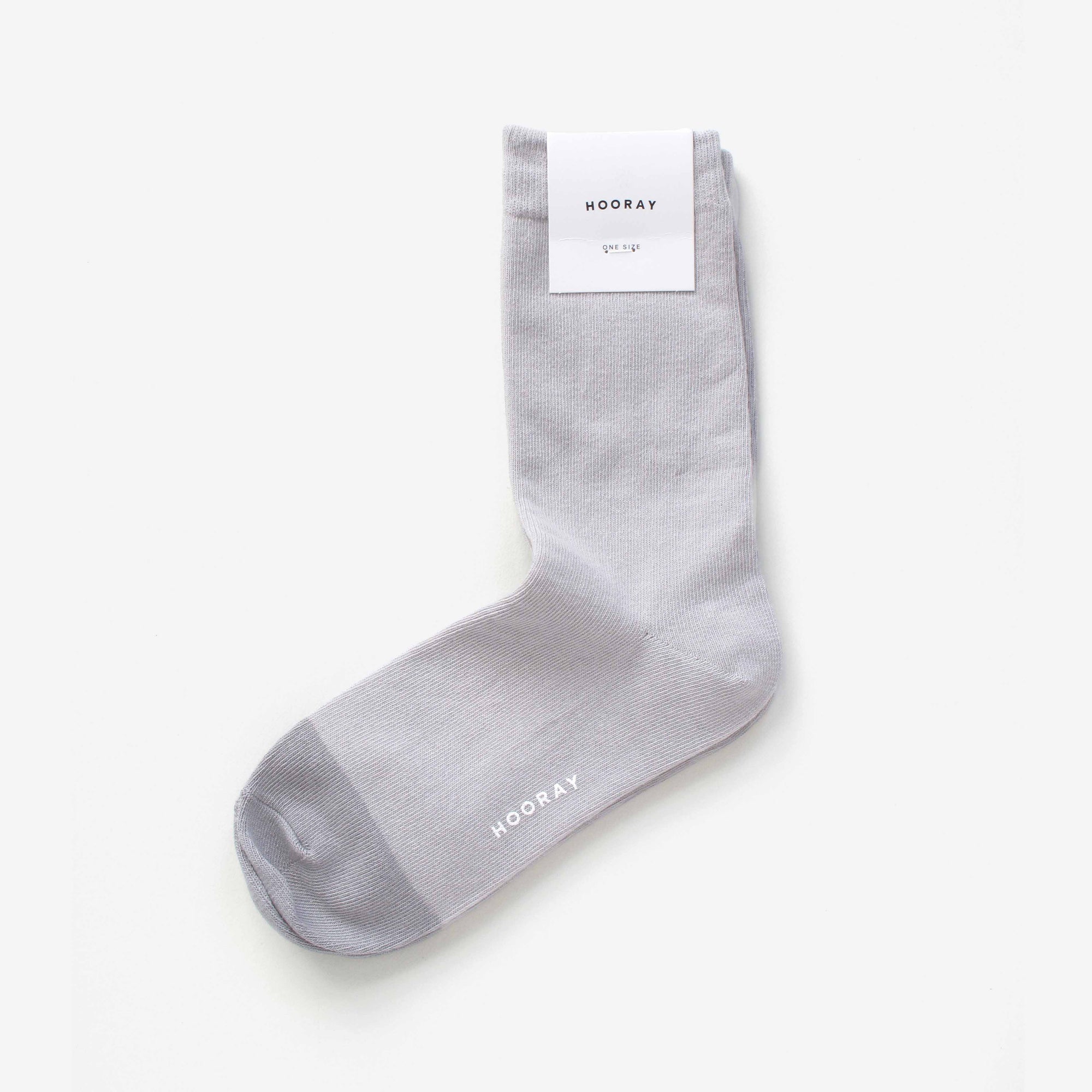 Dolores grey cotton crew sock with Hooray label tag – showcasing the two-tone design and craftsmanship.