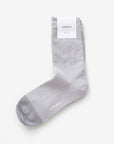 Dolores grey cotton crew sock with Hooray label tag – showcasing the two-tone design and craftsmanship.