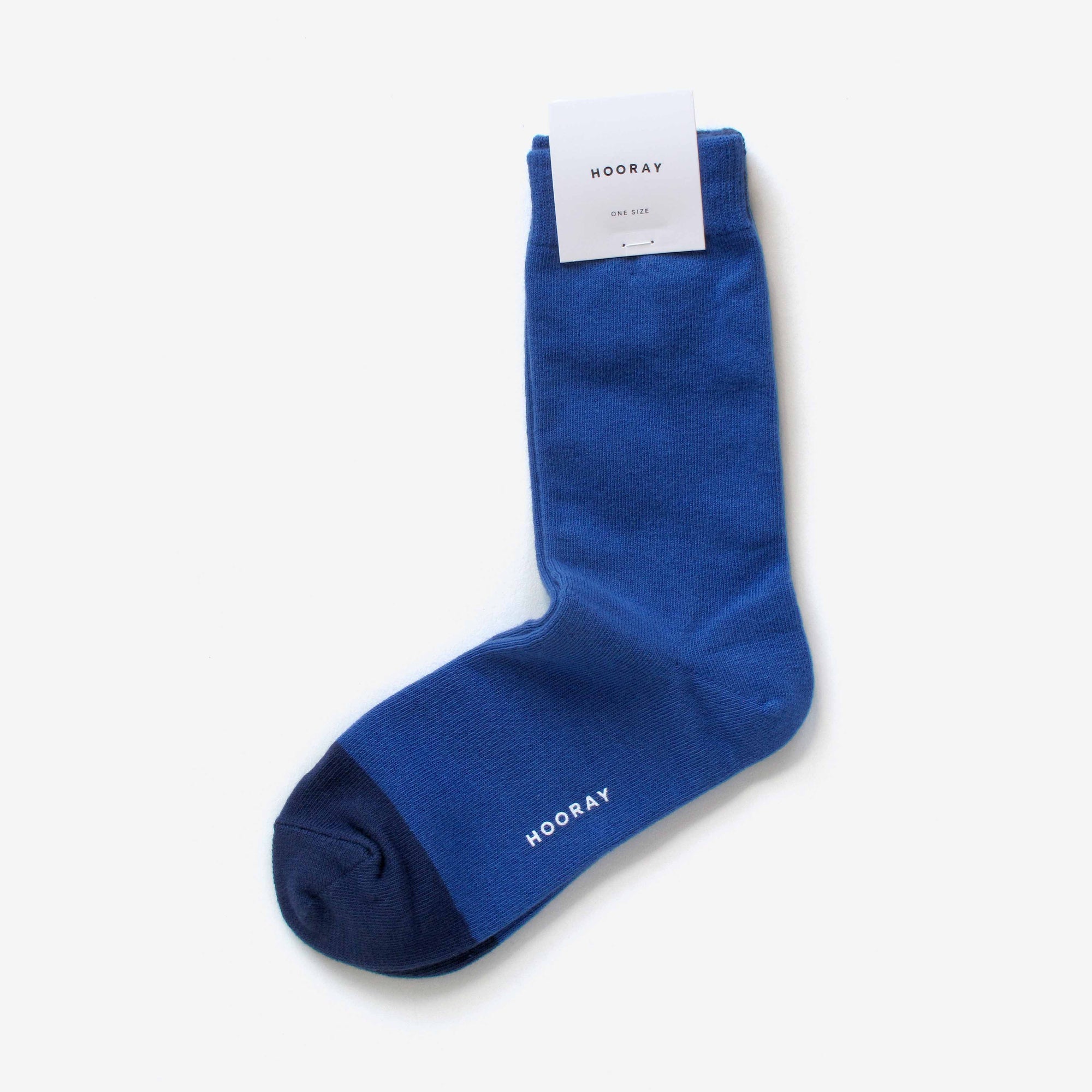 Huntington ocean blue cotton crew socks with Hooray label tag – showcasing the two-tone design and craftsmanship.