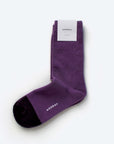 Ina purple cotton crew sock with Hooray label tag – showcasing the two-tone design and craftsmanship.