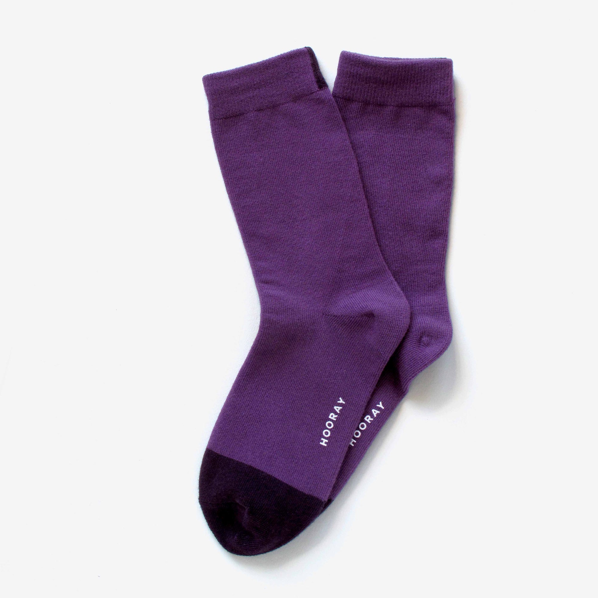 Ina purple cotton crew sock – showcasing the two-tone design.